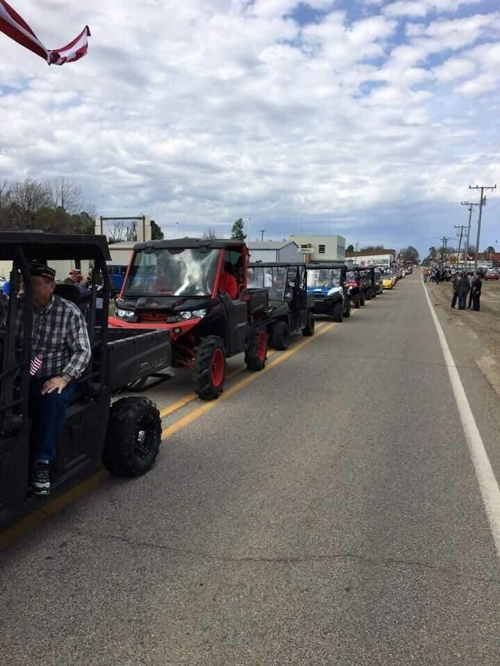 a line of utility terrain vehicle