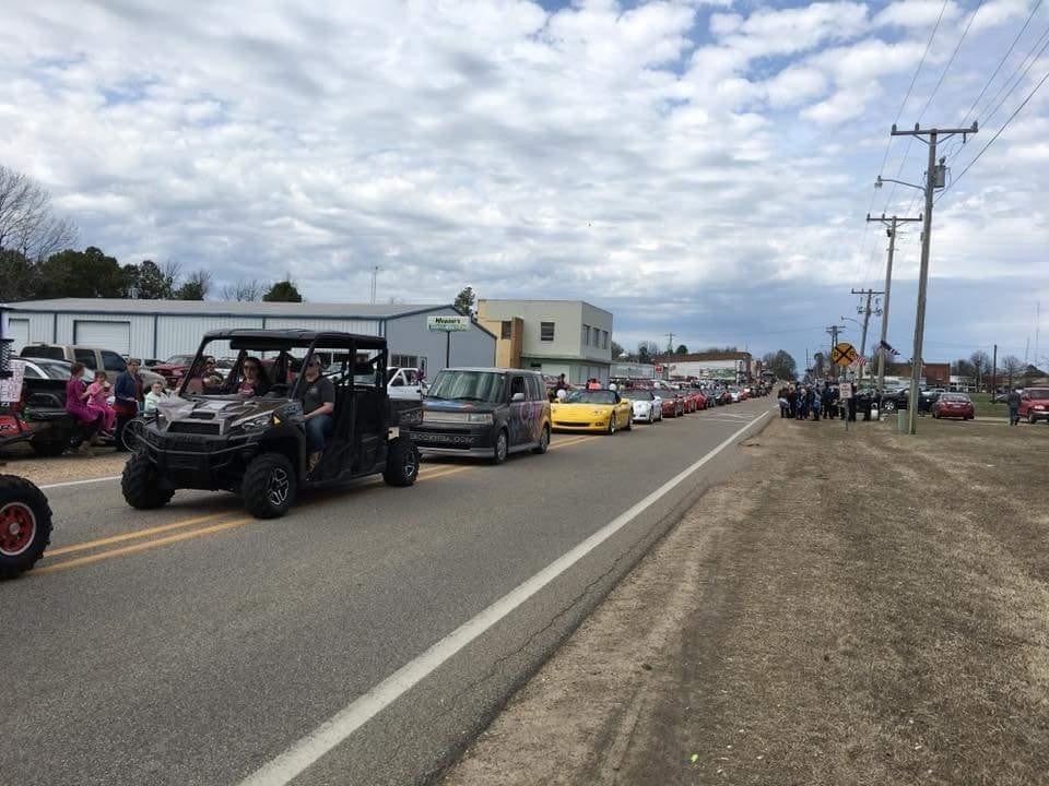 dark colored utility vehicle in the foreground